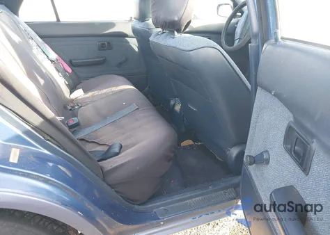 1990 Toyota Corolla Dlx from USA, damaged, VIN 1NXAE94A2LZ108562